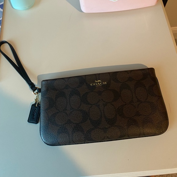 Coach Handbags - Coach dark brown signature wristlet